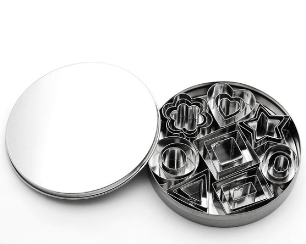 Stainless steel cookie cutters nested in a round tin.